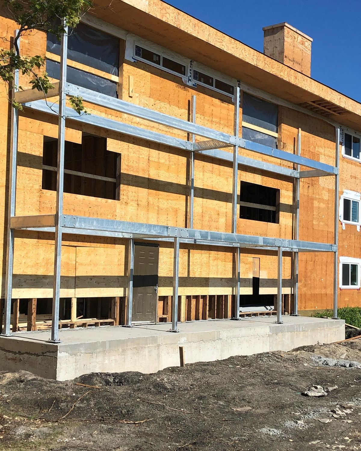 Structural steel building addition